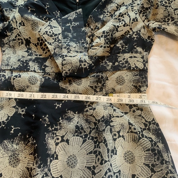 Brand: Alexander McQueen
Category: Dress. Colors: Black and Gold flowers - Picture 4 of 11